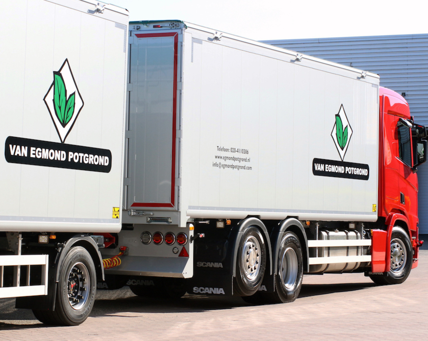 Scania with semi-trailer and trailer with moving floor from Kraker